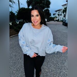 Light Blue Sweatshirt With Diva Sparkled Star Sleeves NWOT